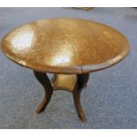 OAK CIRCULAR TOPPED TABLE ON 4 SHAPED SUPPORTS,