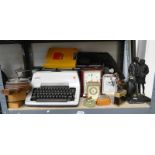 OLYMPIA TYPEWRITER, 3 MANTLE CLOCKS, 3 LIGHTERS, ANEROID BAROMETER, GOLFING FIGURES,