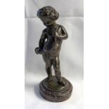 BRONZE FIGURE OF A CHERUB PLAYING A HORN IMPRESSED CLODION ON RED MARBLE BASE - 18 CM TALL