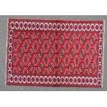 RED AFGHAN BALUCHI WOOL RUG WITH BAKHARA DESIGN - 178 X 127CM