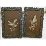 PAIR OF CARVED ORIENTAL PANELS WITH CARVED HARDWOOD FRAMES INSET WITH MOTHER OF PEARL,