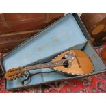 LUIGI EMBERGHER MANDOLIN WITH CASE Condition Report: Cracks to finger board.