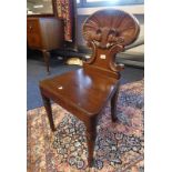 19TH CENTURY MAHOGANY HALL CHAIR WITH DECORATIVE CARVED BACK ON TURNED SUPPORTS