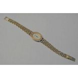 18CT GOLD LADIES LONGINES WRISTWATCH WITH DIAMOND SET CASE ON AN 18CT GOLD MESH LINK BRACELET WITH