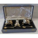 CASED SILVER 3 PIECE CRUET SET WITH BLUE GLASS LINERS AND LIONS MASK PAW FEET WITH SPOONS BY JOSEPH