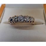 9CT GOLD 5-STONE DIAMOND SET RING IN SCROLL MOUNT