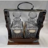 MAHOGANY AND SILVER PLATED 2 - DECANTER TANTALUS WITH 2 MODERN SILVER LABELS