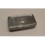 GEORGE IV SILVER OBLONG SNUFF BOX WITH FOLIATE THUMB PIECE BY EDWARD SMITH, BIRMINGHAM 1829 - 7.