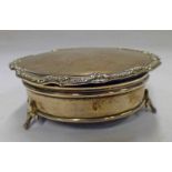 SILVER CIRCULAR JEWELLERY BOX ON 3 SPREADING SUPPORTS,