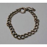 9CT GOLD CURB LINK BRACELET - 18.