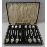 CASED SET OF 12 SILVER TEASPOONS AND SUGAR TONGS,