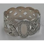 SCOTTISH SILVER NAPKIN RING WITH PIERCED CELTIC KNOT PATTERN BY CELTIC ART INDUSTRIES,