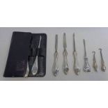 2 SILVER HANDLED BUTTON HOOKS, 2 SETS OF 3 SILVER HANDLED MANICURE ITEMS,