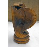 WOODEN CARVING OF A STRIKING COBRA
