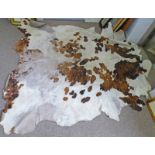 COW HIDE RUG 220CM LONG