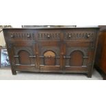 19TH CENTURY OAK DRESSER OF 3 DRAWERS OVER 3 PANEL DOORS WITH DECORATIVE CARVING ON SQUARE SUPPORTS,