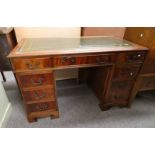 LATE 20TH CENTURY MAHOGANY TWIN PEDESTAL DESK WITH GREEN LEATHER INSET TOP AND NINE DRAWERS - 122