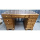 PINE KNEE-HOLE DESK OF 8 DRAWERS WITH LEATHER INSERT IN TOP - WIDTH 122 CM X HEIGHT 177 CM