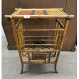 BAMBOO MAGAZINE RACK WITH PAINTED ORIENTAL SCENE IN TOP Condition Report: The item