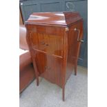 MAHOGANY CASED UNITONE GRAMAPHONE WITH LIFT UP TOP AND 4 PANEL DOORS ON TAPERED SUPPORTS
