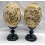 PAIR OF 19TH CENTURY JAPANESE OSTRICH EGGS WITH SHIBAYAMA DECORATION DEPICTING BIRDS AND TREES ON A