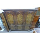 19TH CENTURY WALNUT TRIPLE DOOR WARDROBE ON SHAPED SUPPORTS,