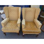 PAIR OF BLUE & GOLD WINGBACK ARMCHAIRS ON QUEEN ANNE SUPPORTS WITH FLUER DE LIS PATTERN