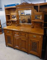 LATE 19TH CENTURY OAK MIRROR BACK SIDEBOARD WITH FALL FRONT PANEL DOOR FLANKED BY 2 DRAWERS OVER 4