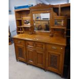 LATE 19TH CENTURY OAK MIRROR BACK SIDEBOARD WITH FALL FRONT PANEL DOOR FLANKED BY 2 DRAWERS OVER 4