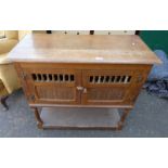 19TH CENTURY OAK CABINET WITH 2 CARVED PANEL DOORS ON TURNED SUPPORTS,