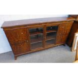 WALNUT BOOKCASE WITH 2 CENTRAL GLASS PANEL DOOR FLANKED BY 2 PANEL DOORS MARKED GALLOWAY & SKYES