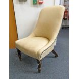 19TH CENTURY OVERSTUFFED NURSING CHAIR ON TURNED MAHOGANY SUPPORTS