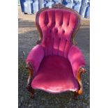 19TH CENTURY MAHOGANY FRAMED BUTTON BACK GENTLEMAN'S ARMCHAIR WITH CARVED DECORATION ON CABRIOLE