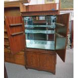 INLAID MAHOGANY COCKTAIL CABINET WITH FITTED INTERIOR BEHIND 2 PANEL DOORS,