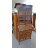 EARLY 20TH CENTURY OAK BUREAU BOOKCASE WITH 2 ASTRAGAL GLASS PANEL DOORS OVER BASE OF FALL FRONT