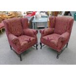 PAIR OF WINGBACK ARMCHAIRS ON MAHOGANY QUEEN ANNE SUPPORTS