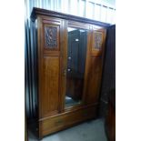 LATE 19TH CENTURY MIRROR DOOR WARDROBE OVER BASE OF SINGLE DRAWER ON SQUARE SUPPORTS,