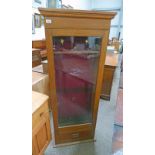 OAK FRAMED GUN CABINET WITH GLASS PANEL DOOR OVER SINGLE DRAWER,