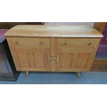 ERCOL STYLE BLONDE BEECH SIDEBOARD OF 2 DRAWERS OVER 2 PANEL DOORS ON TAPERED SUPPORTS,