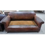 EARLY 20TH CENTURY OVERSTUFFED LEATHER 2 SEATER SETTEE ON OAK BALL SUPPORTS Condition