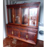 EASTERN HARDWOOD DRESSER WITH 4 GLASS PANEL DOORS OVER BASE OF 4 DRAWERS OVER 4 PANEL DOORS WITH