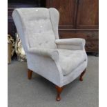 WINGBACK ARMCHAIR ON SMALL QUEEN ANNE SUPPORTS