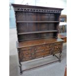 19TH CENTURY OAK WELSH DRESSER WITH SHELF BACK OVER BASE OF 2 CENTRAL DRAWERS FLANKED BY 2 PANEL