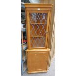 WALNUT CORNER CABINET WITH GLASS PANEL DOOR OVER PANEL DOOR,