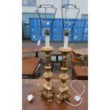 PAIR OF GILT TABLE LAMPS WITH DECORATIVE CARVING Condition Report: The plugs have