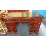 MAHOGANY TWIN PEDESTAL DESK OF 9 DRAWERS WITH LEATHER INSET TOP,