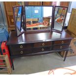 STAG MAHOGANY DRESSING TABLE WITH MIRRORS OVER 6 DRAWERS ON SQUARE SUPPORTS.