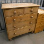 PINE CHEST OF 2 SHORT OVER 3 LONG DRAWERS ON TURNED SUPPORTS,
