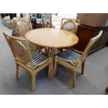 SET OF 4 BAMBOO EFFECT CHAIRS WITH BERGERE BACKS AND CIRCULAR TABLE ON BAMBOO EFFECT BASE DIAMETER