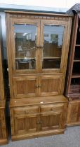 ERCOL ELM CABINET WITH 2 GLASS PANEL DOORS & 2 PANEL DOORS OVER BASE OF 2 DRAWERS OVER 2 PANEL